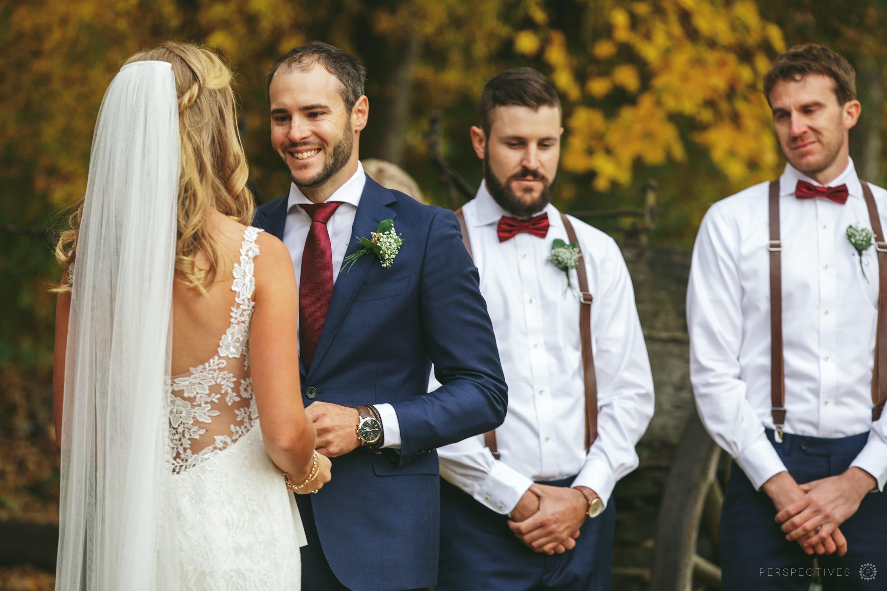 groom laughs in wedding ceremony