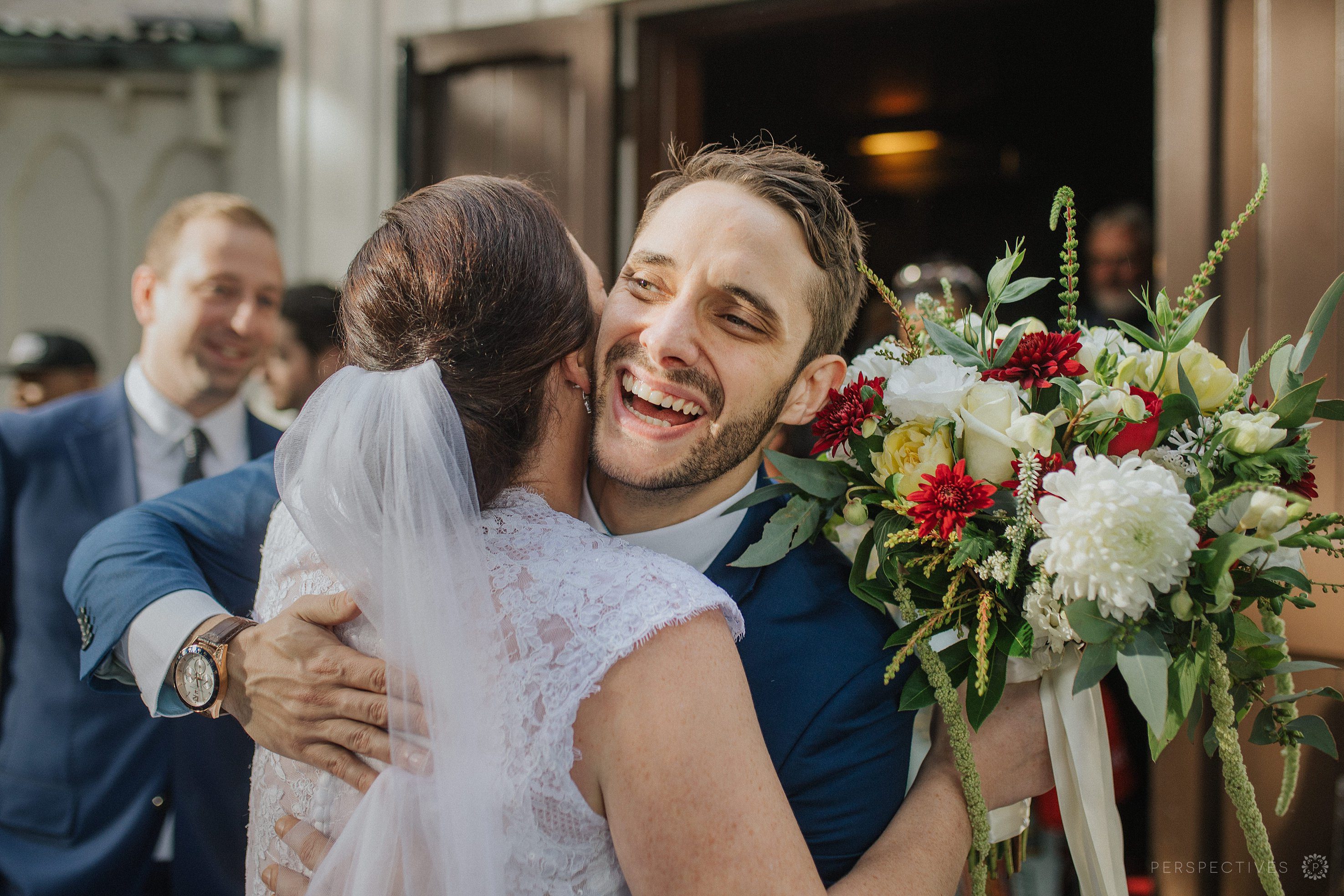 Guest congratulates bride after wedding ceremony