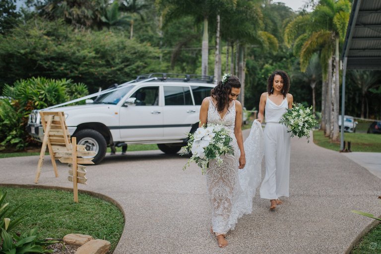 Cairns wedding photos - bride walking to ceremony from car