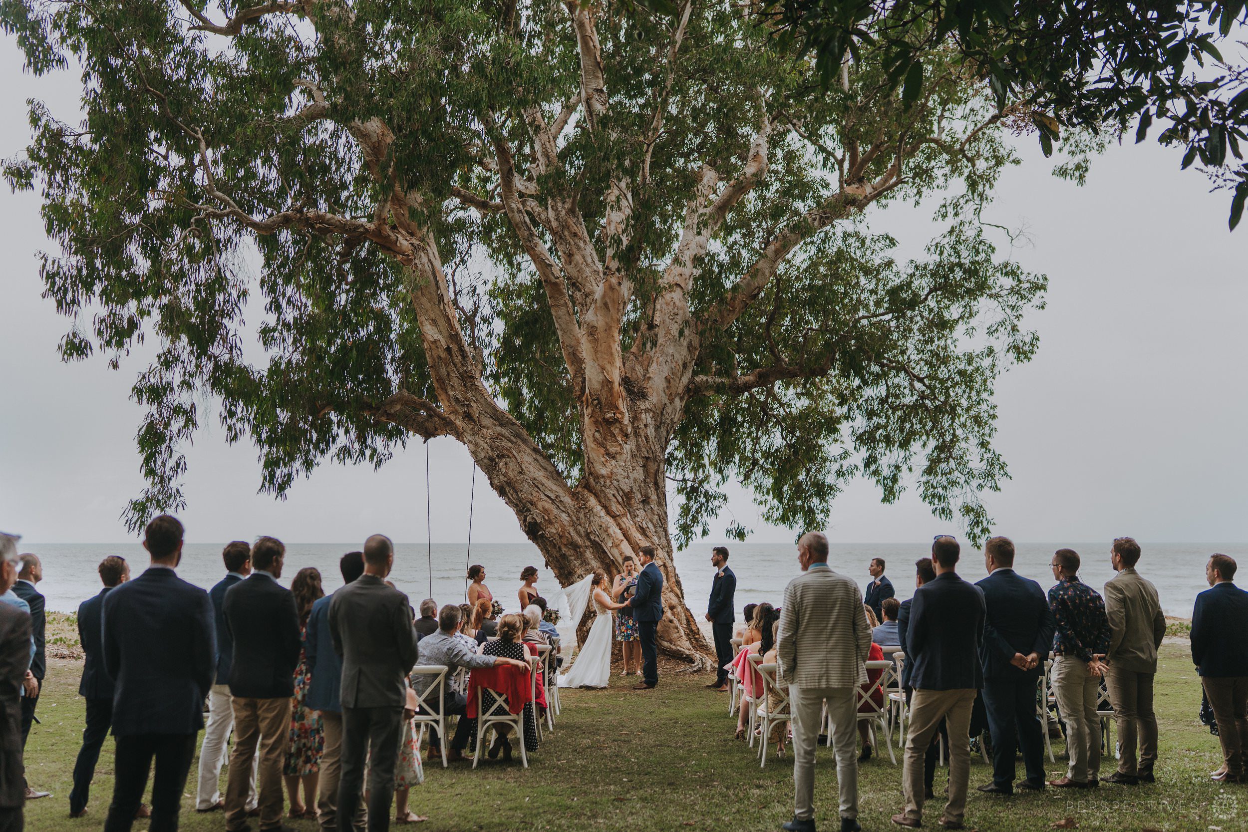 Ellis Beach Yacht Club wedding ceremony under tree