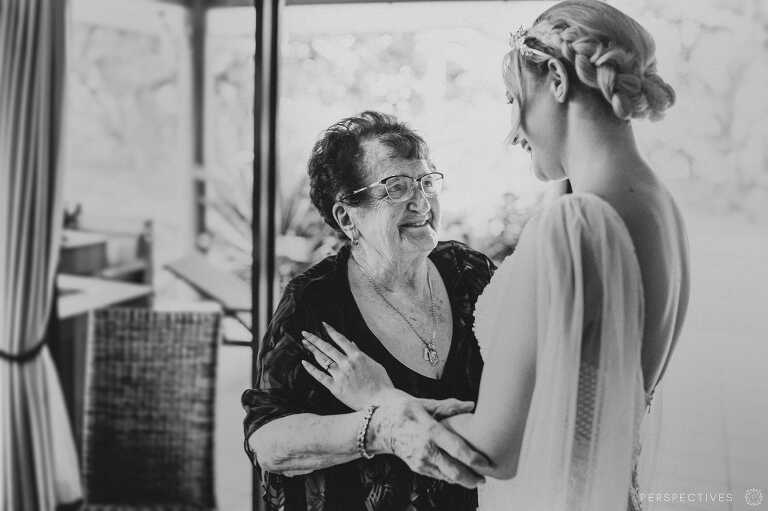Bride hugging Grandma Cairns wedding photographer