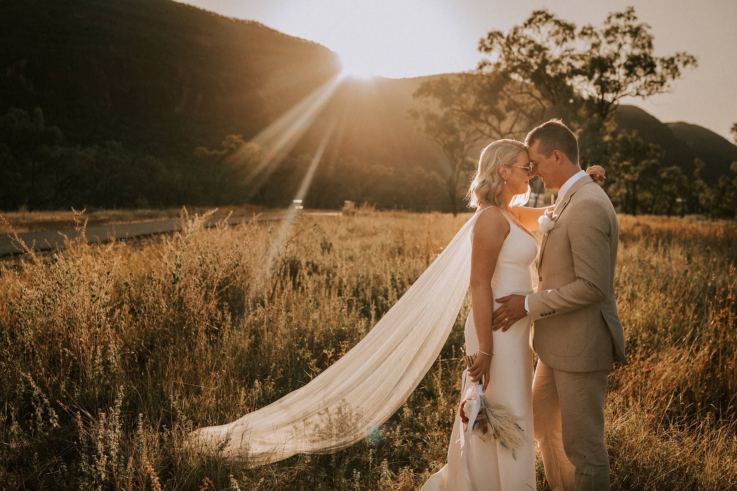 Backlight sun with bride & groom at Mount Mulligan