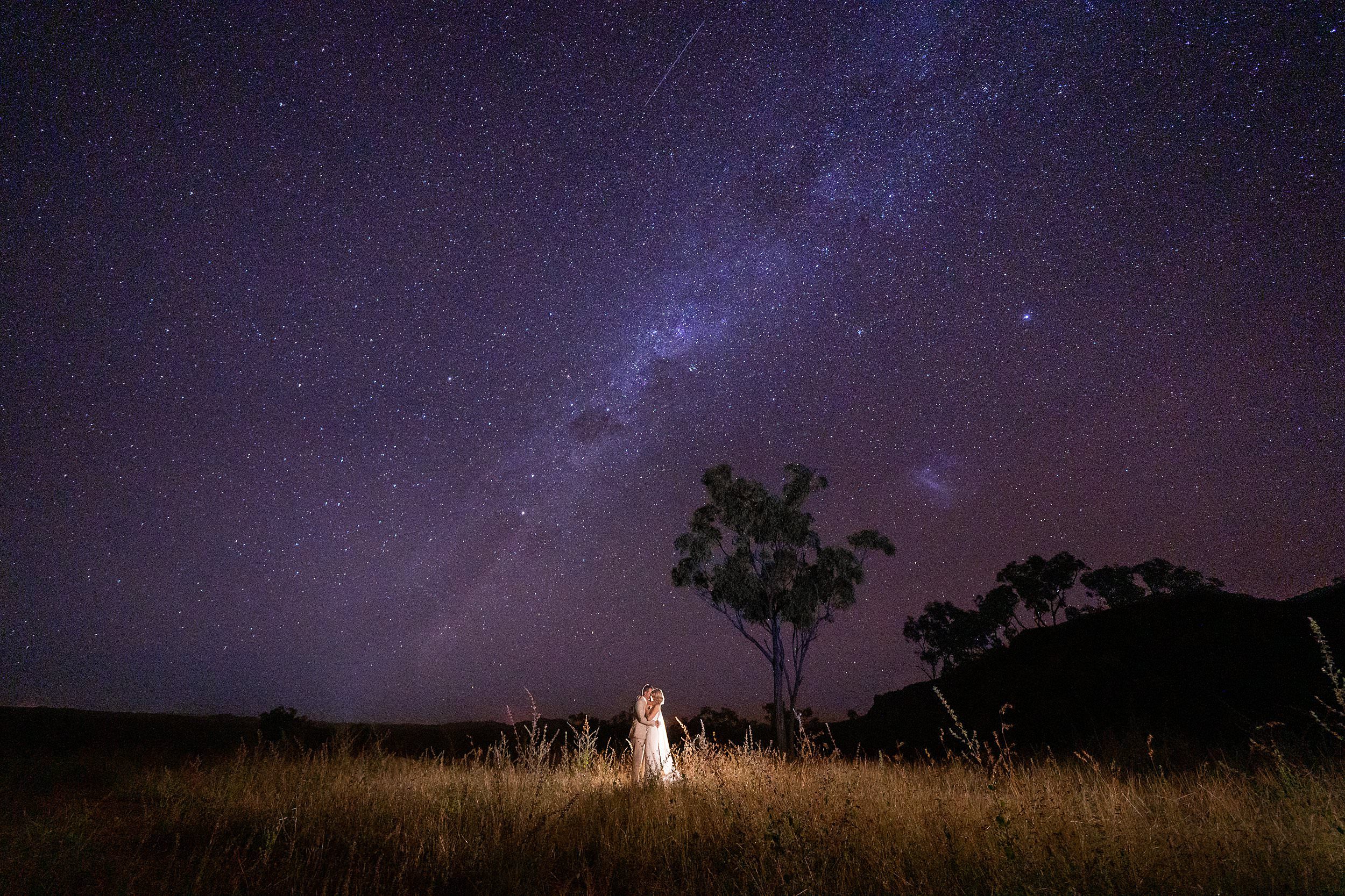 Elopement wedding photo under the milky way stars at Mount Mulligan Lodge