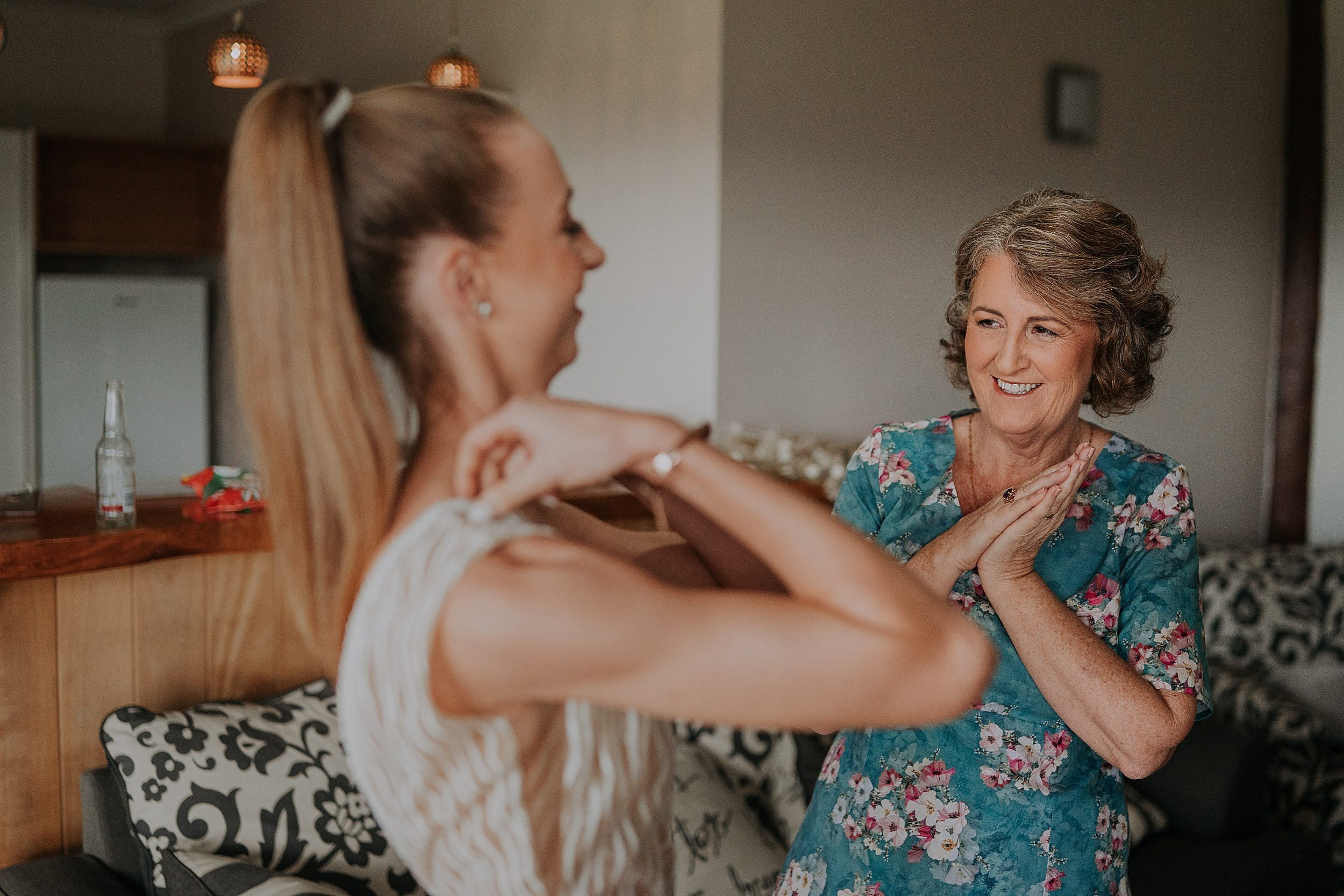 Mother's reaction to bride on wedding