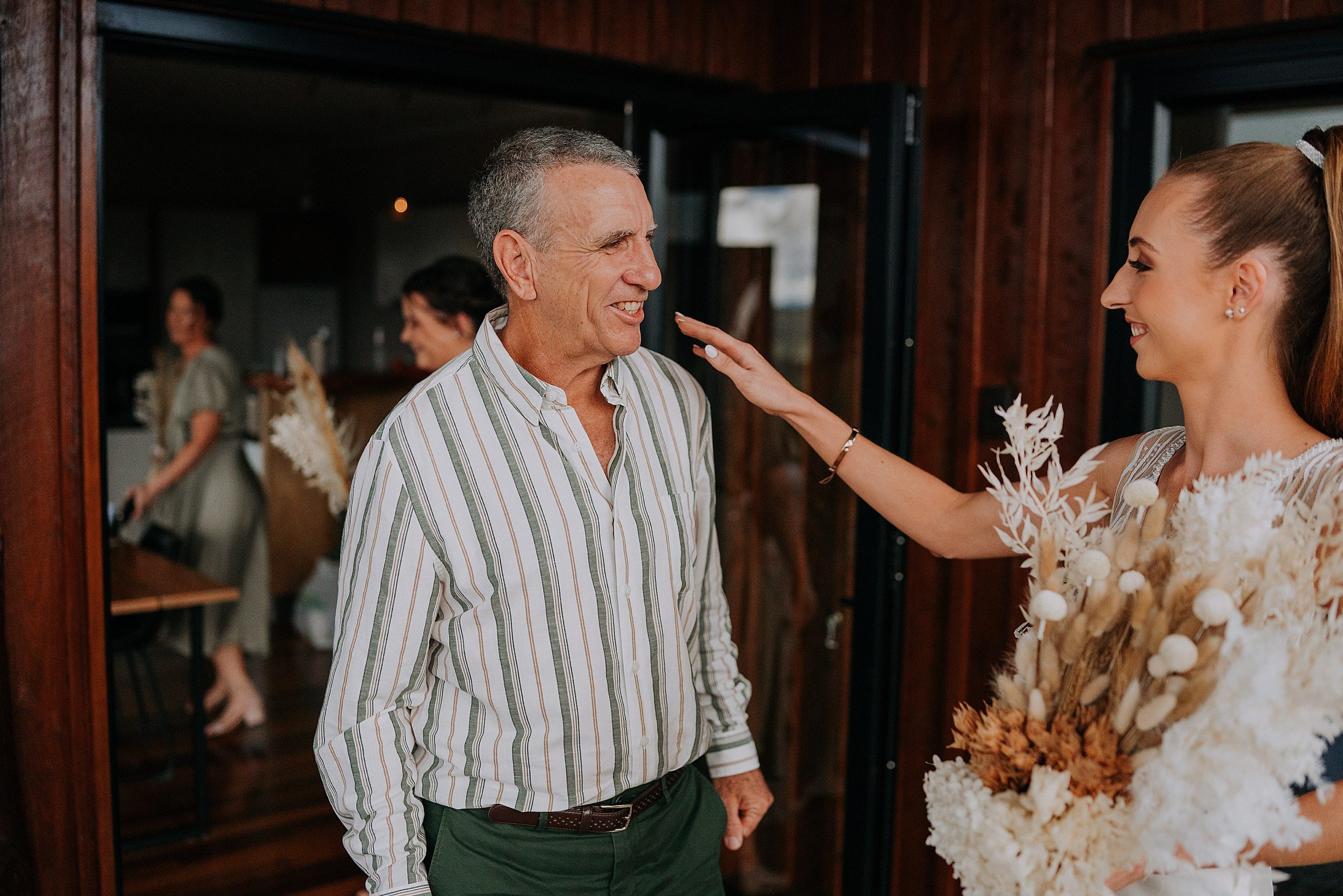 Father's reaction to bride on wedding
