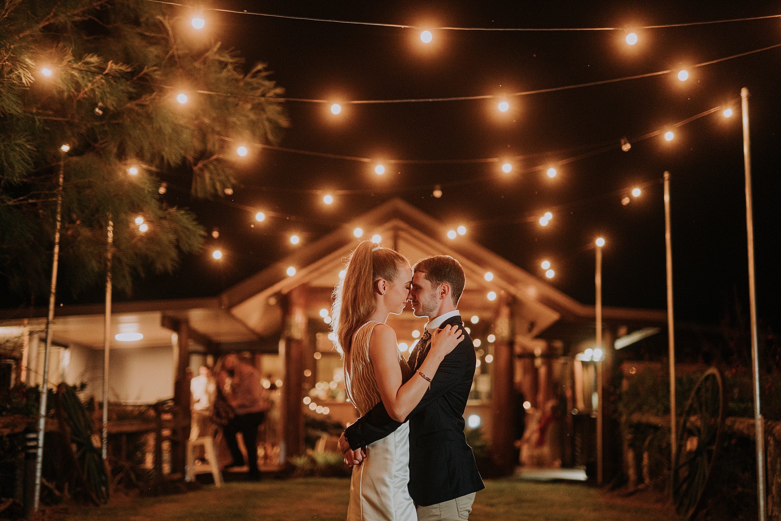 Mount Quincan wedding photos at night under festoon lights