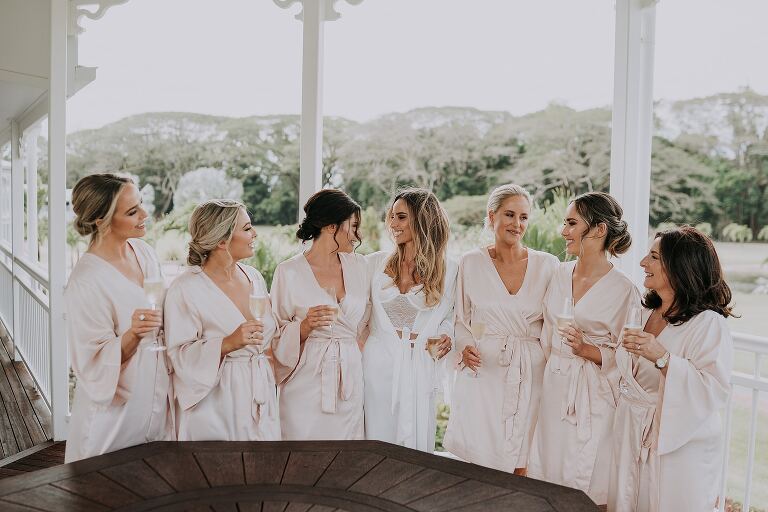 Bridal party on the deck of Lakeside Retreat in Mowbray