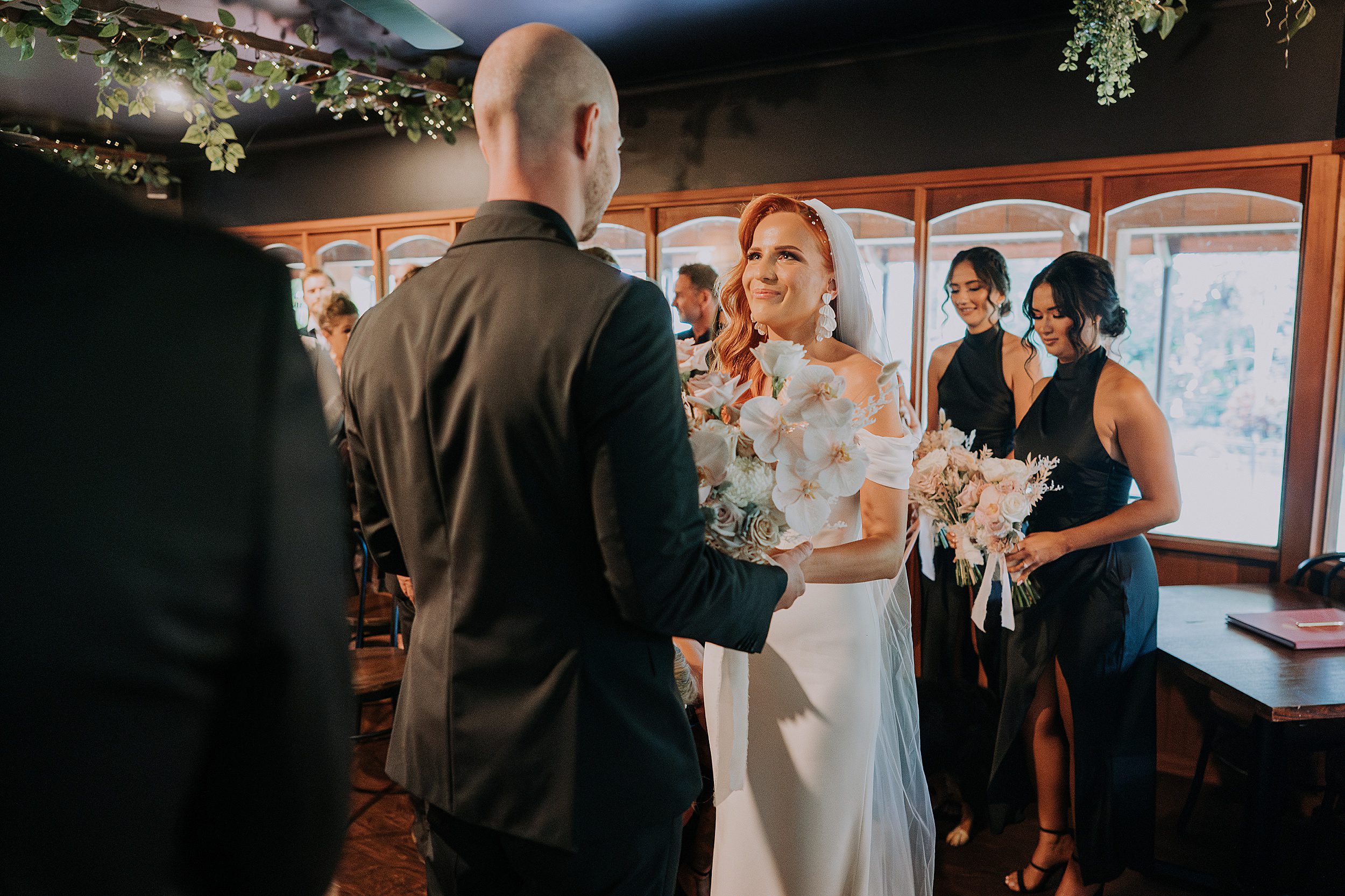 Malanda Lodge rainy wedding day indoor ceremony