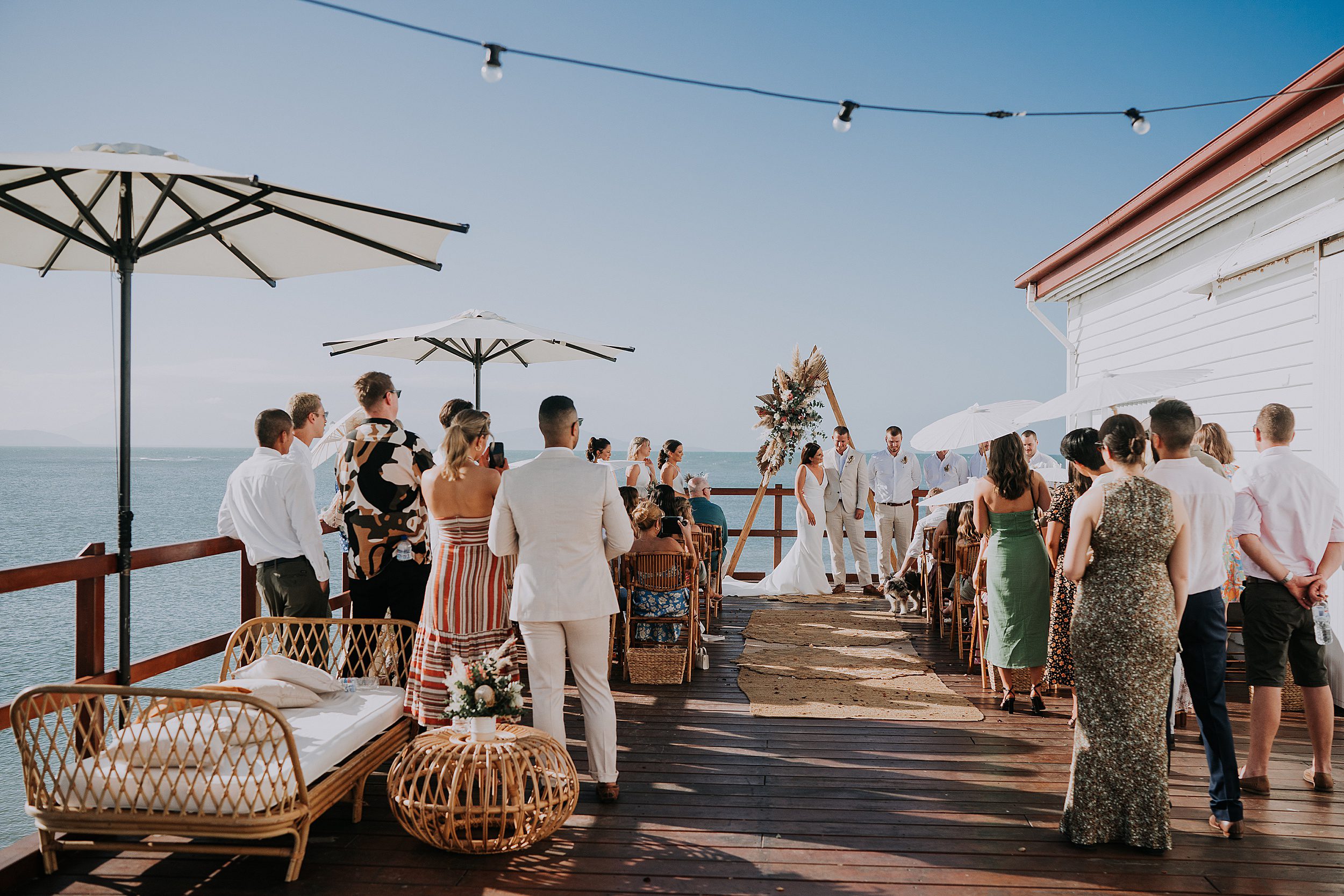 wedding ceremony setup on deck at Sugar Wharf Port Douglas